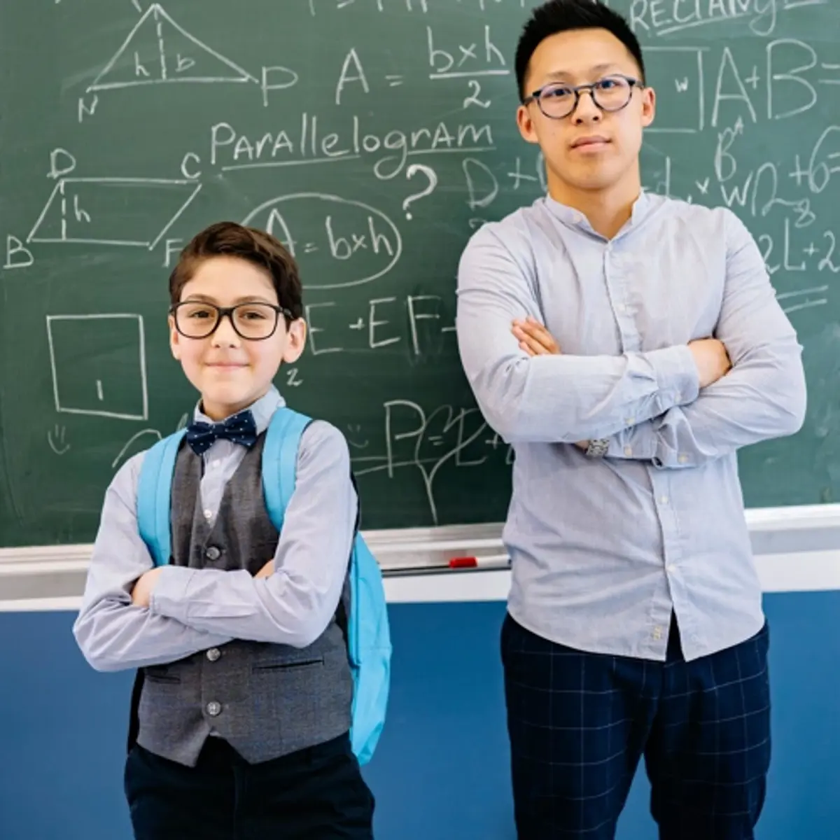 Mentor with student in classroom